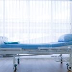Bedroom for patient in a hospital, Empty bed on hospital ward. Bedroom for patient in a hospital, Empty bed on hospital ward.